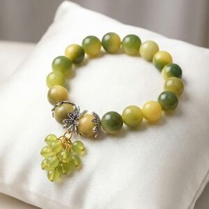 Elegant Green Beaded Bracelet with Charm